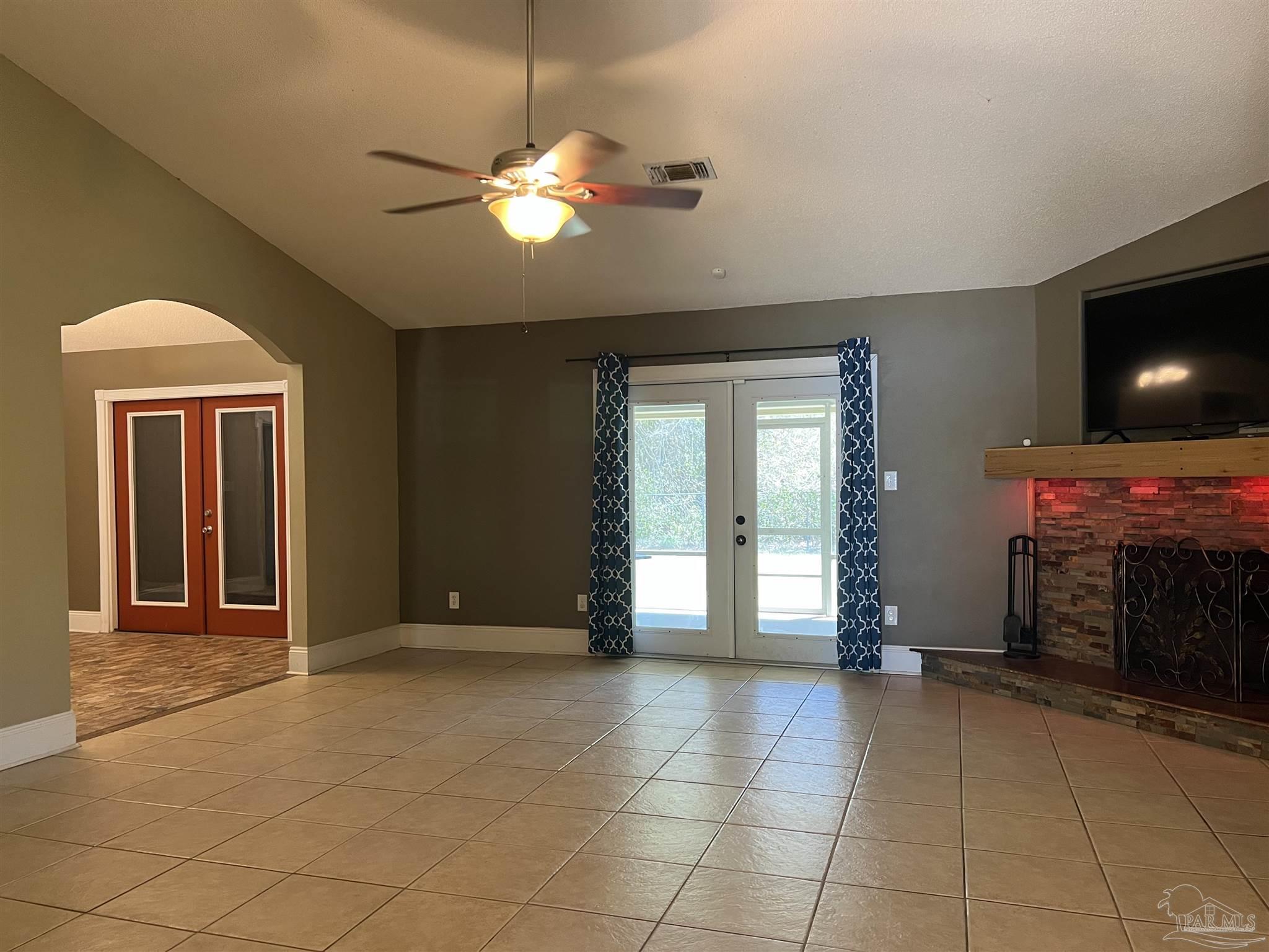 12465 Red Cloud Road Pensacola, FL 32507 - Photo 6 of 68 a view of a livingroom with furniture and chandelier
