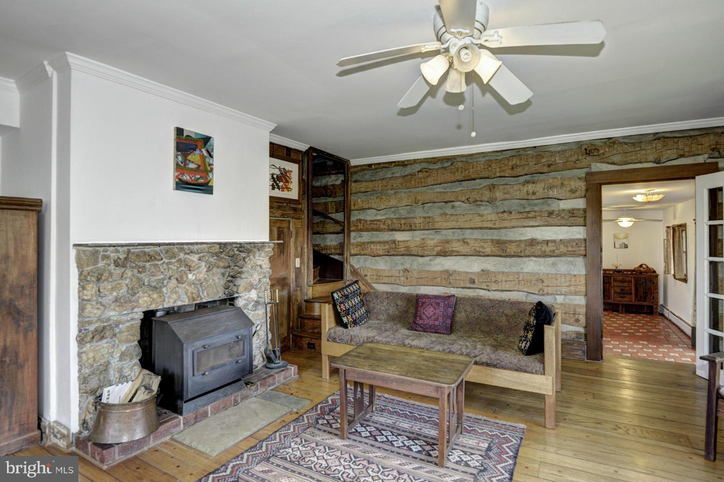 16501 Comus Road Dickerson, MD 20842 - Photo 5 of 29 a living room with furniture and a fireplace