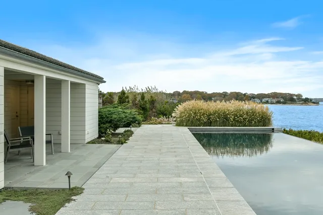 a view of a patio with lake view