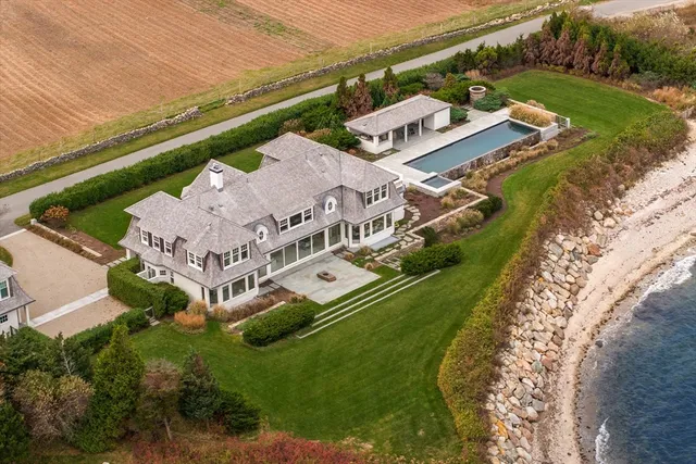 an aerial view of a house with a garden