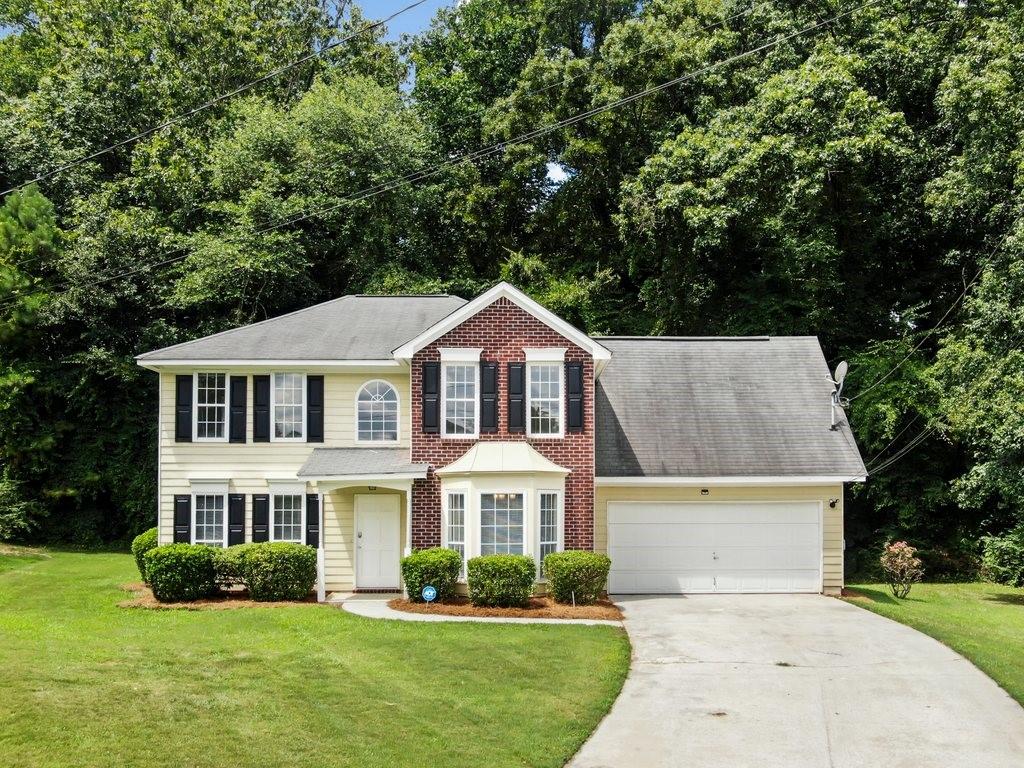 4353 Horseshoe Court Decatur, GA 30034 - Photo 1 of 1 a front view of a house with a yard