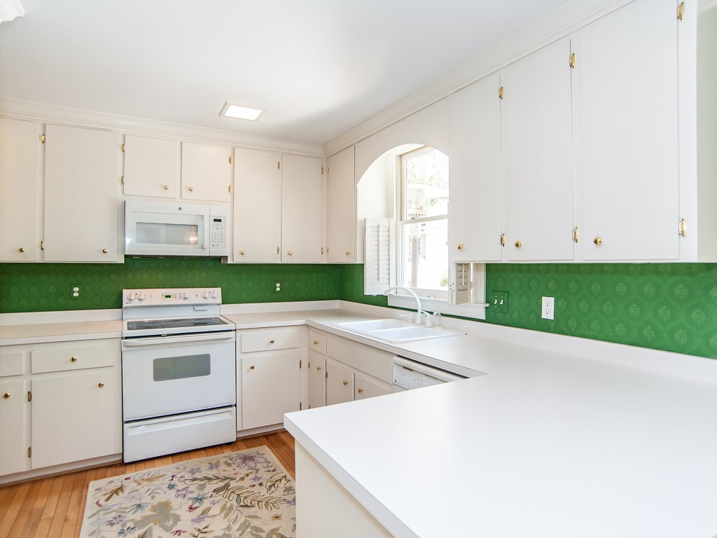 6920 Slade Hill Road Raleigh, NC 27615 - Photo 11 of 30 Eat in Kitchen overlooking gorgeous backyard Kitchen
