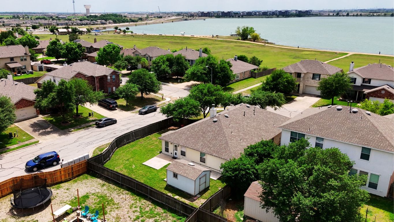 18301 Masi Loop Pflugerville, TX 78660 - Photo 1 of 1 an aerial view of a house with a swimming pool and outdoor seating