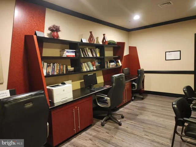 a room with furniture and wooden floor