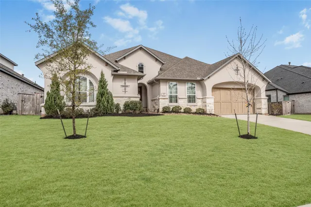 $699,900 | 622 Platinum Stone Lane, Pinehurst, TX 77362