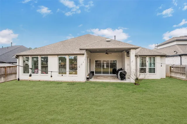 $699,900 | 622 Platinum Stone Lane, Pinehurst, TX 77362