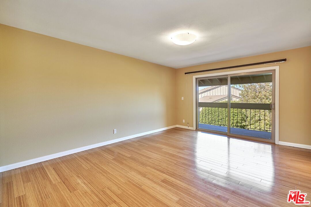 28227 Ridgepoint Court Rancho Palos Verdes, CA 90275 - Photo 13 of 34 a view of an empty room with wooden floor and a window