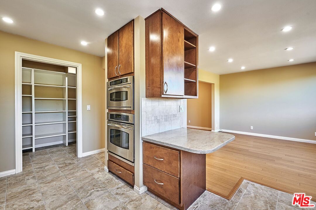 28227 Ridgepoint Court Rancho Palos Verdes, CA 90275 - Photo 16 of 34 a kitchen with stainless steel appliances granite countertop a stove and a refrigerator