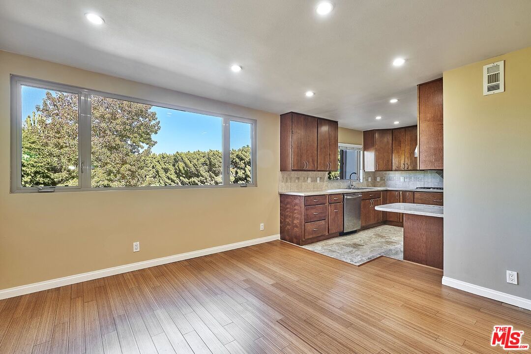 28227 Ridgepoint Court Rancho Palos Verdes, CA 90275 - Photo 23 of 34 a kitchen with a wooden floor and window