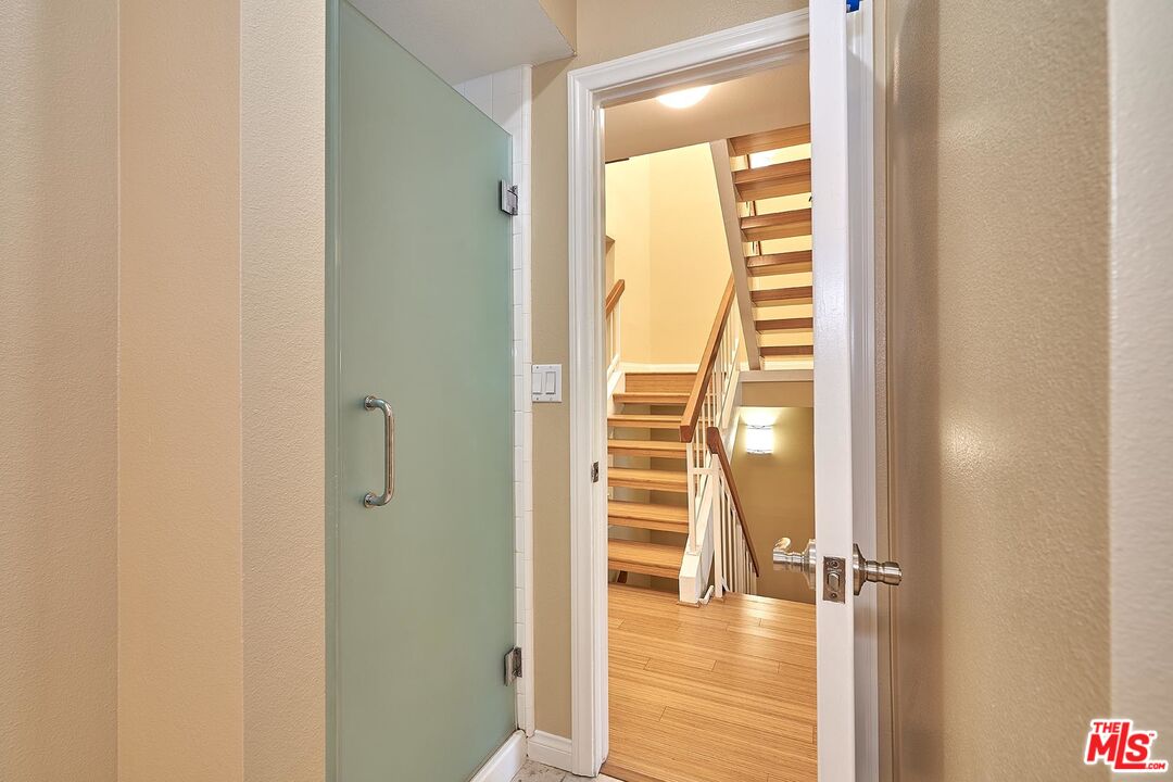 28227 Ridgepoint Court Rancho Palos Verdes, CA 90275 - Photo 25 of 34 a view of a bathroom with a glass door