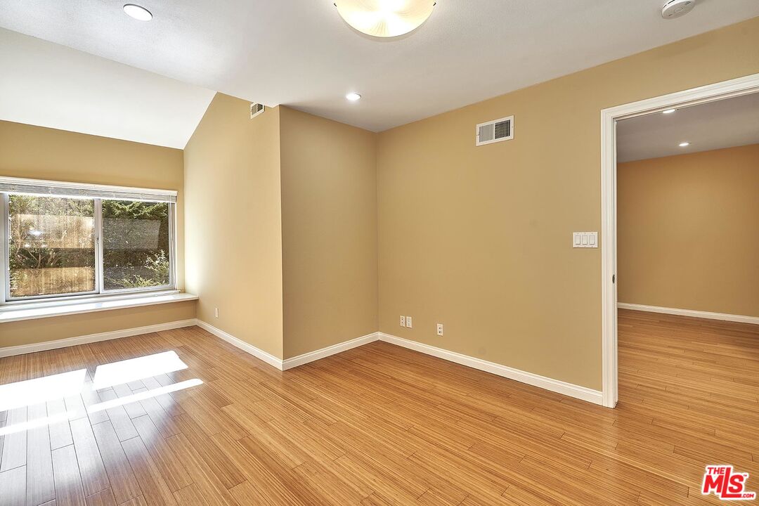 28227 Ridgepoint Court Rancho Palos Verdes, CA 90275 - Photo 28 of 34 a view of empty room with wooden floor and fan