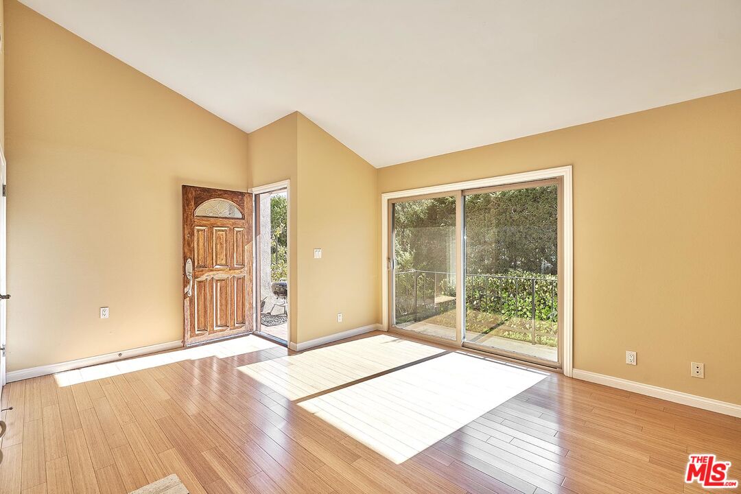 28227 Ridgepoint Court Rancho Palos Verdes, CA 90275 - Photo 33 of 34 a view of an empty room with wooden floor and a window
