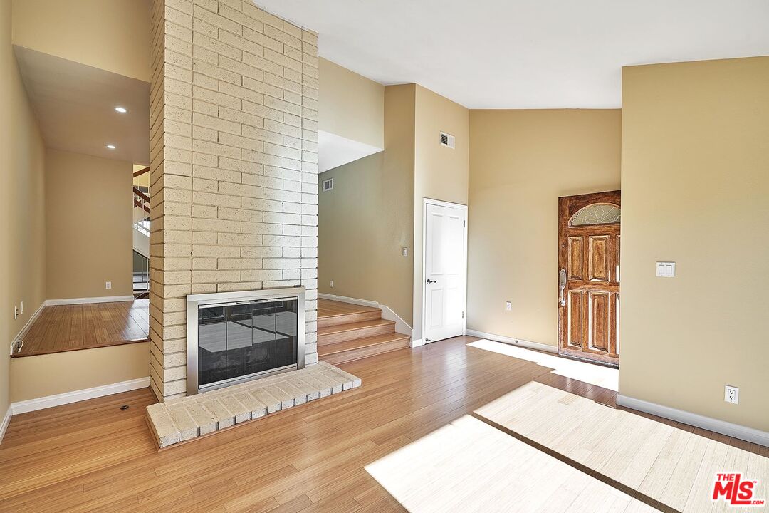 28227 Ridgepoint Court Rancho Palos Verdes, CA 90275 - Photo 34 of 34 a view of a livingroom with wooden floor and staircase