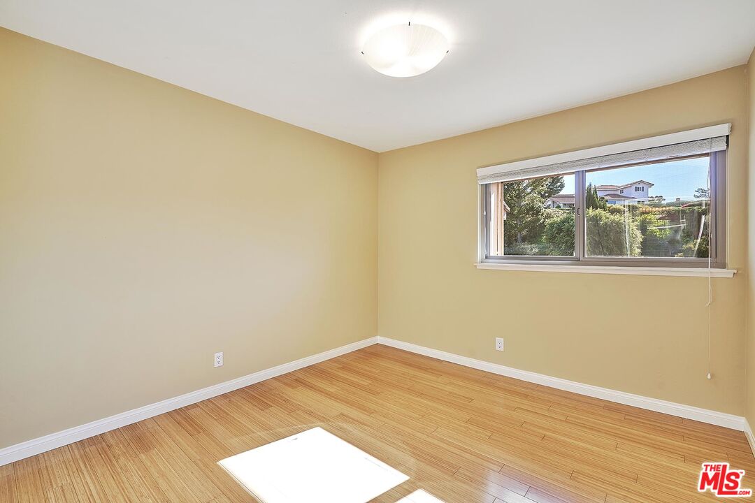 28227 Ridgepoint Court Rancho Palos Verdes, CA 90275 - Photo 5 of 34 a view of empty room with wooden floor and fan