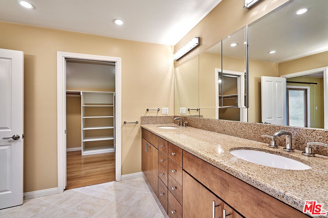 28227 Ridgepoint Court Rancho Palos Verdes, CA 90275 - Photo 7 of 34 a bathroom with a sink double vanity and a shower