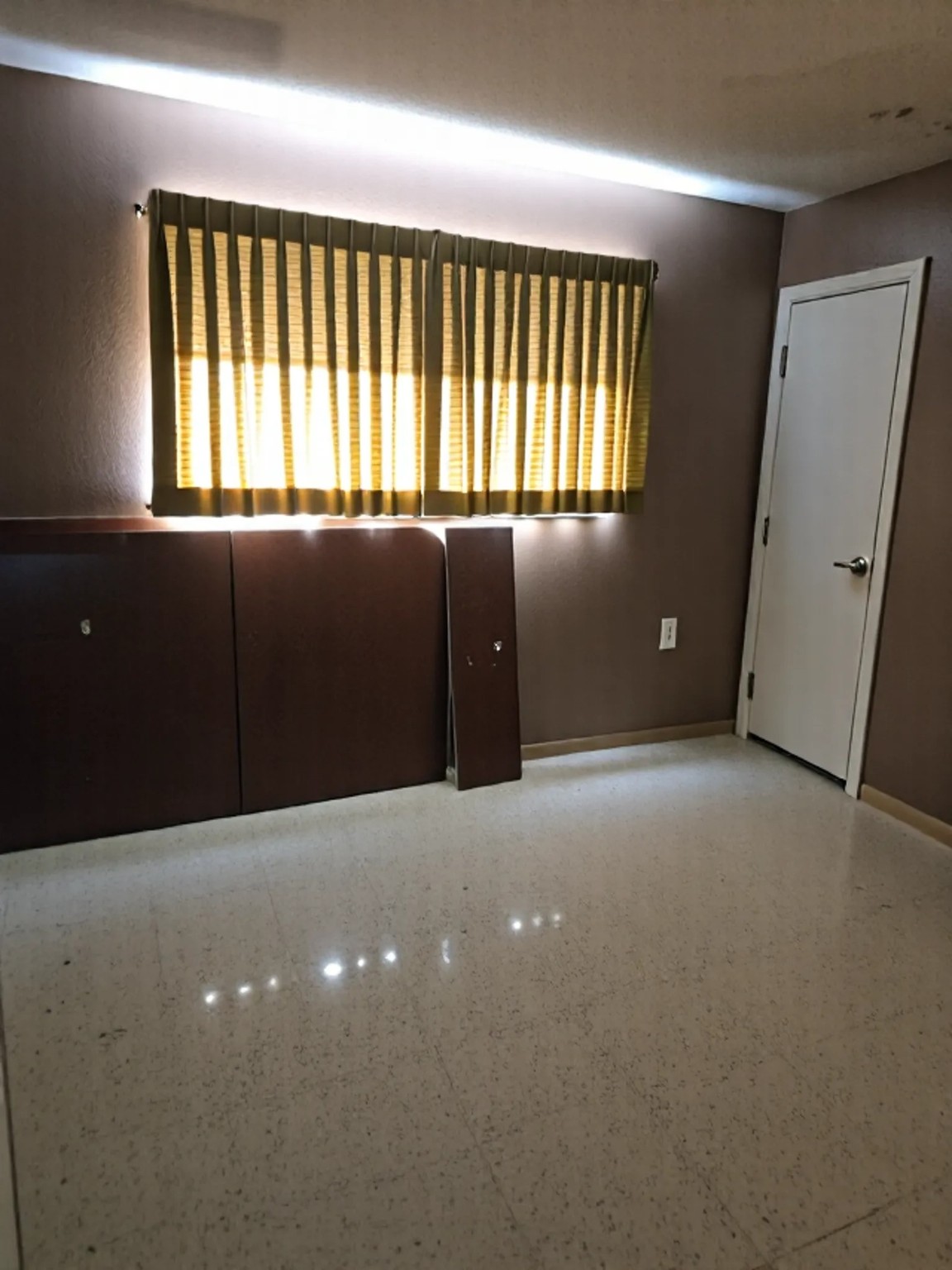 1305 2nd Street Hempstead, TX 77445 - Photo 18 of 24 a view of an empty room with a window