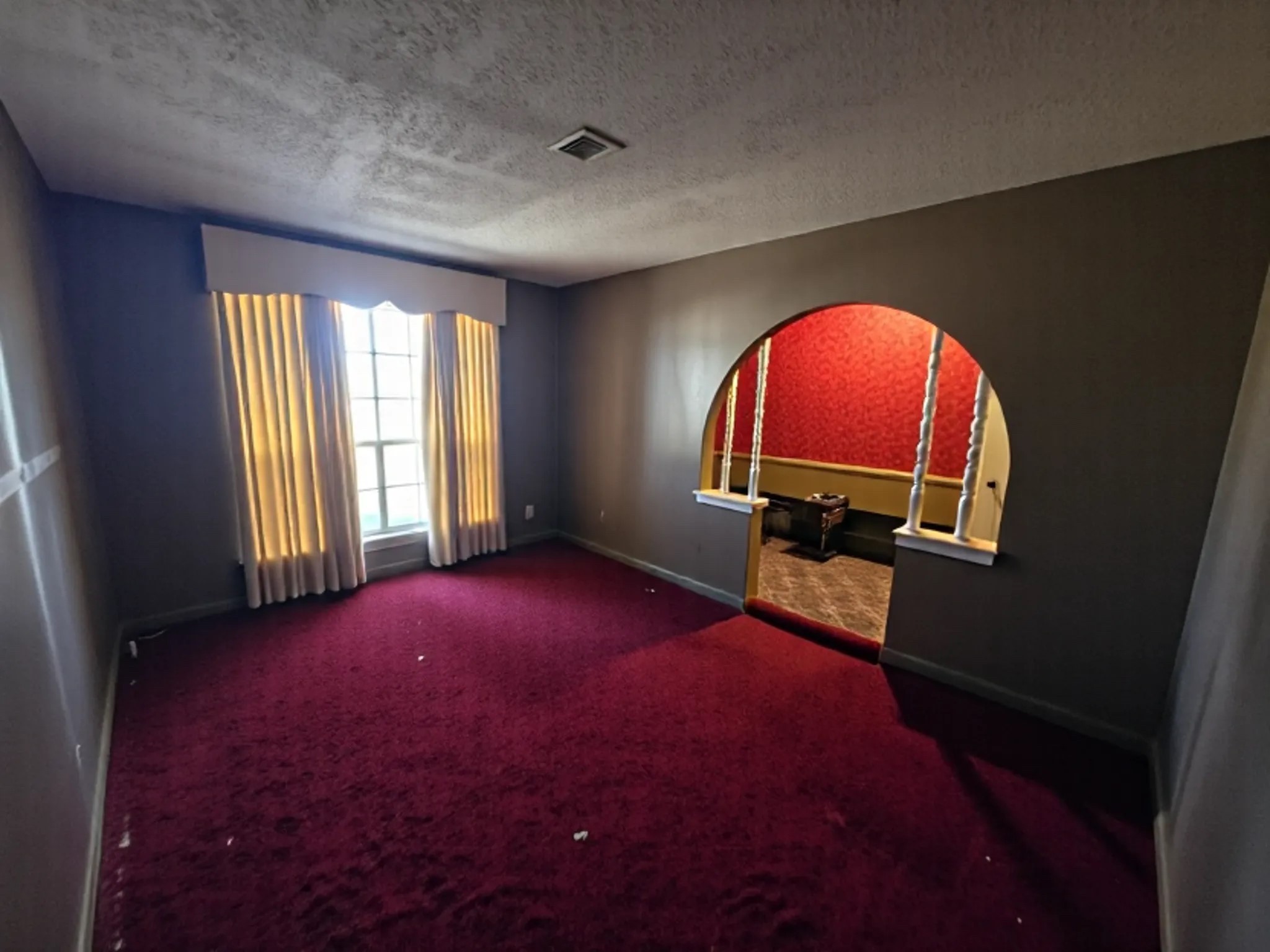 1305 2nd Street Hempstead, TX 77445 - Photo 20 of 24 an empty room with windows table and chair