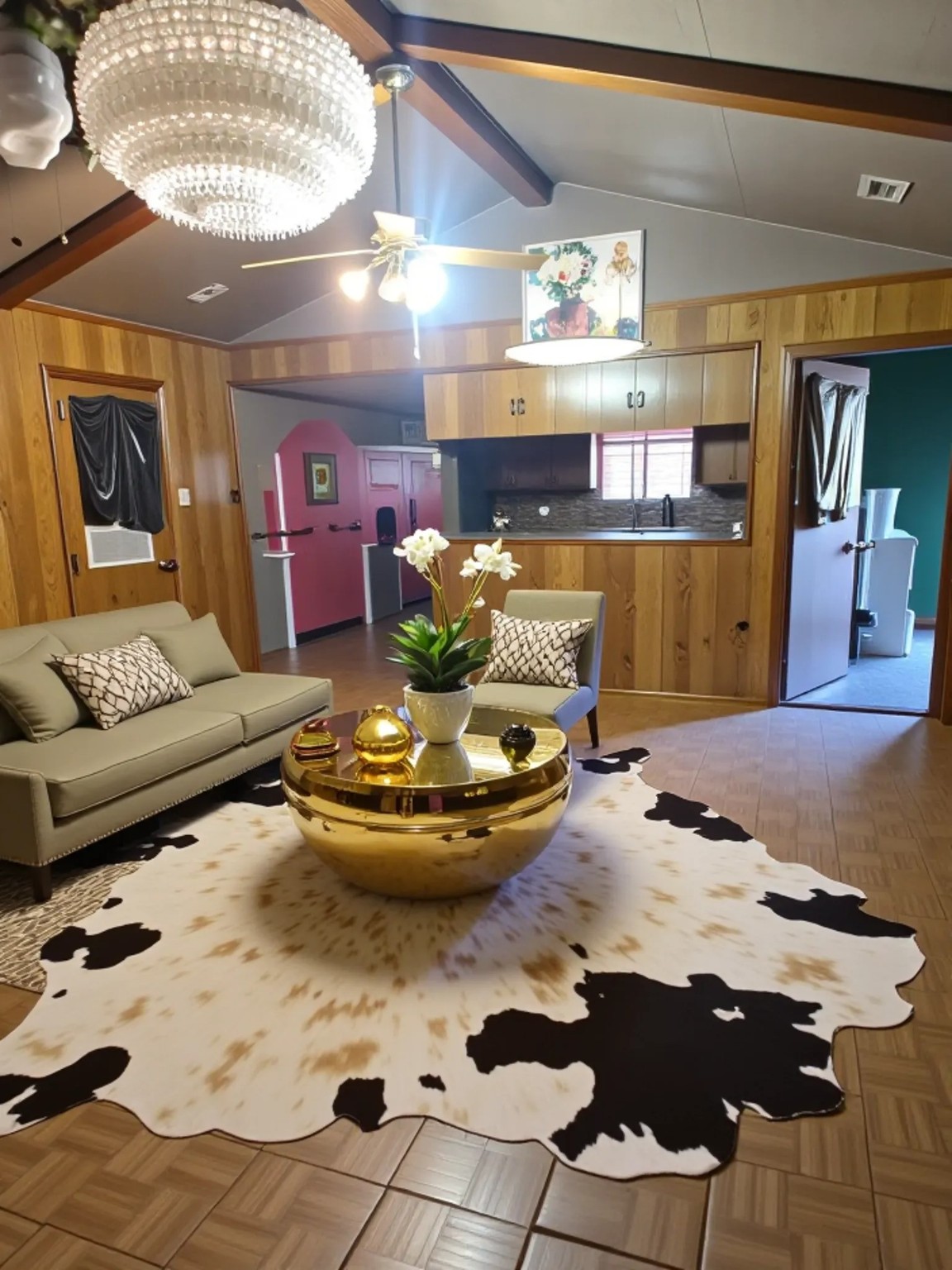 1305 2nd Street Hempstead, TX 77445 - Photo 4 of 24 a living room with furniture and a chandelier