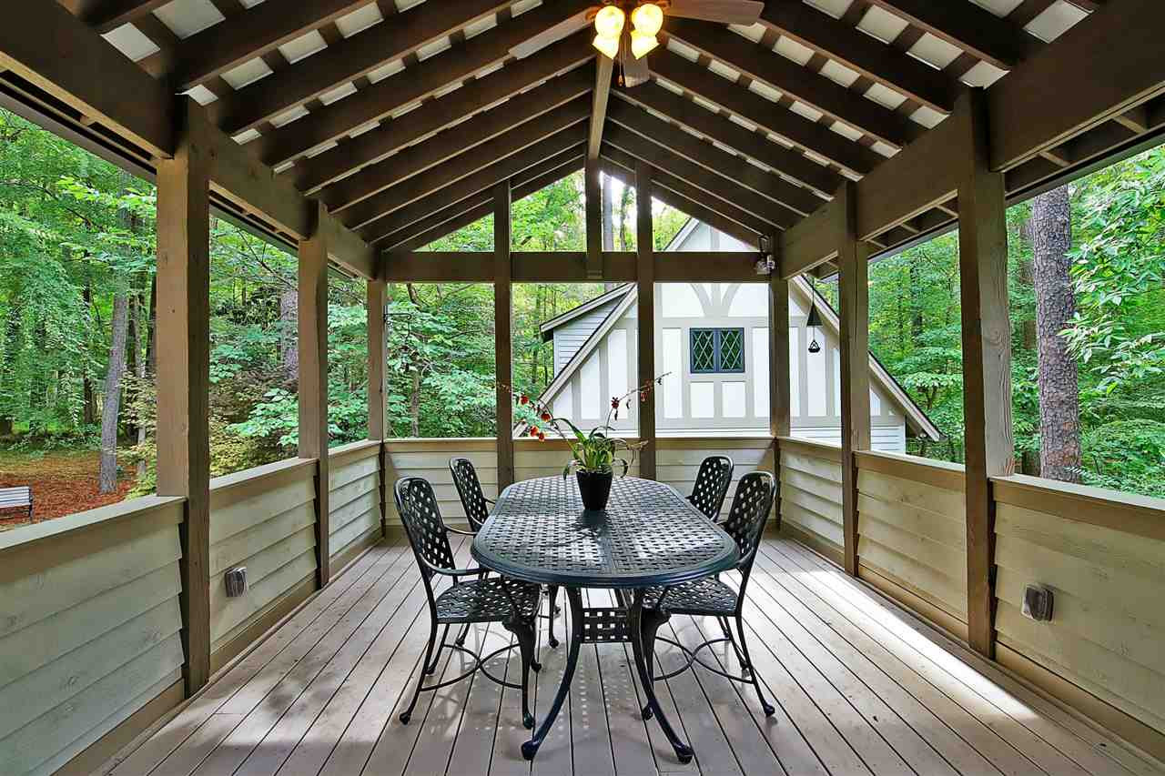 3411 Dover Road Durham, NC 27707 - Photo 16 of 29 Just off the breakfast room, doors lead to a lovely covered porch which looks out onto the rear property. Perfect for al fresco dining. Covered porch