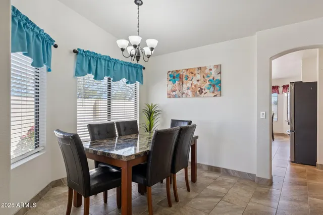 a kitchen with cabinets stainless steel appliances and a counter top space