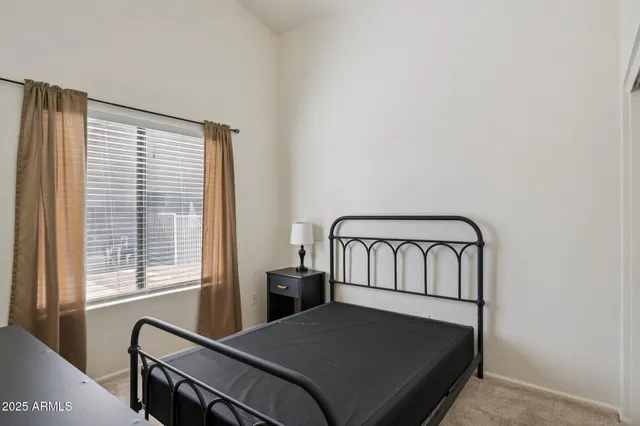 a bathroom with a shower a bathtub and a shower