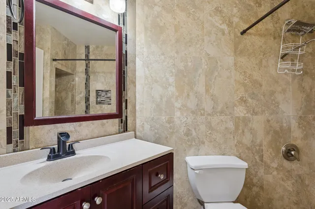 a view of workspace with furniture and window