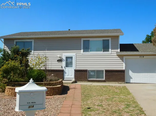 a view of house with outdoor space