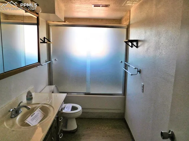 a bathroom with a sink and a tub