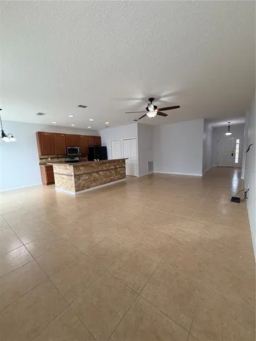 a view of a livingroom and kitchen view