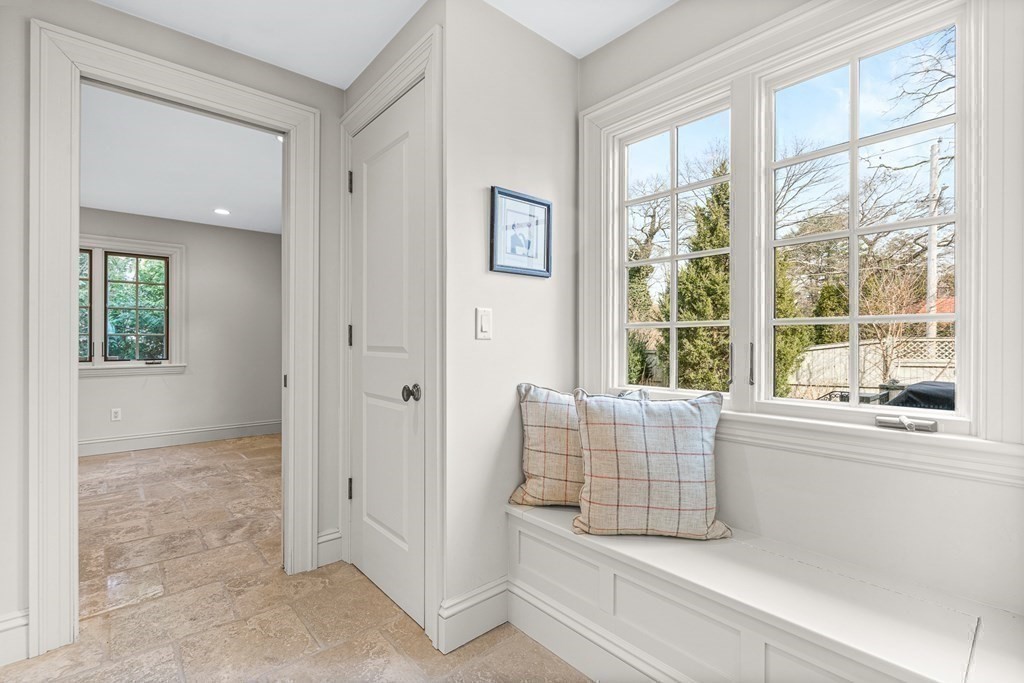 77 Cliff Road Wellesley, MA 02481 - Photo 27 of 33 a living room with furniture and a window