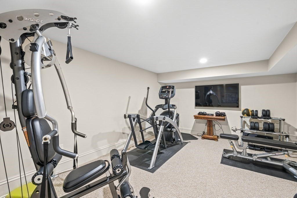 77 Cliff Road Wellesley, MA 02481 - Photo 30 of 33 a view of a room with gym equipment