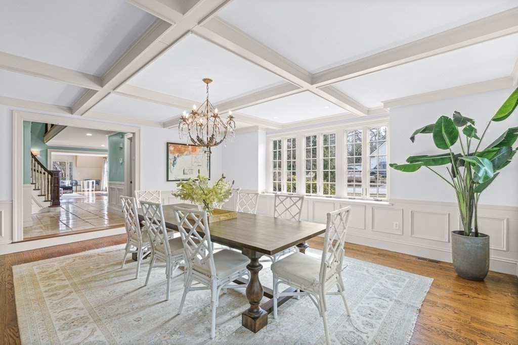 77 Cliff Road Wellesley, MA 02481 - Photo 3 of 33 a view of a dining room with furniture window and wooden floor