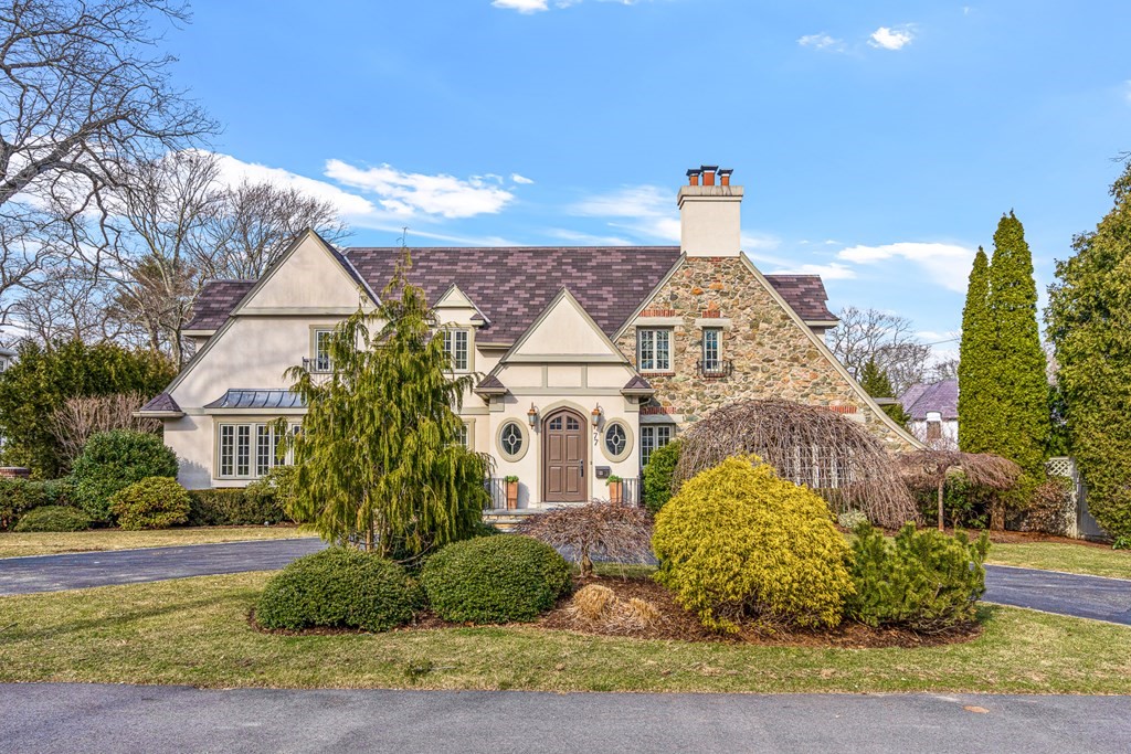 77 Cliff Road Wellesley, MA 02481 - Photo 33 of 33 a front view of a house with garden