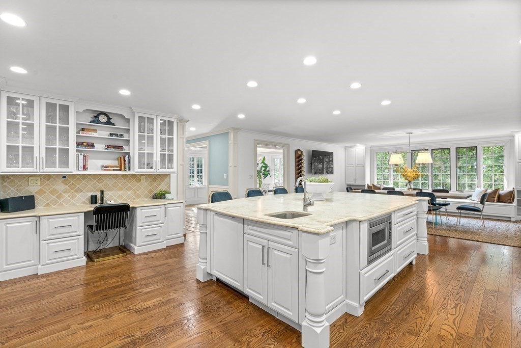 77 Cliff Road Wellesley, MA 02481 - Photo 7 of 33 a kitchen with a stove and a sink