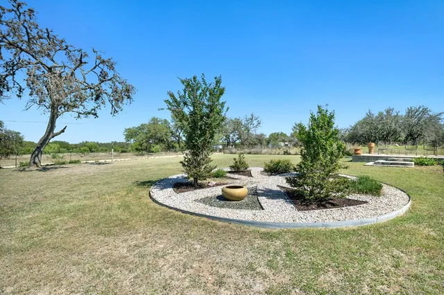 a view of a terrace with sitting area
