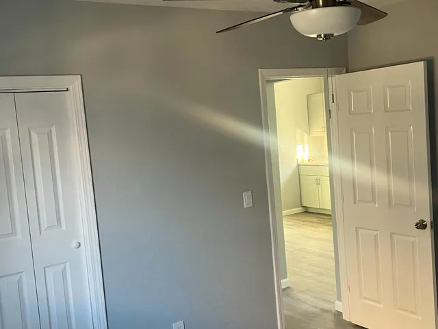 a bathroom with a shower and a sink