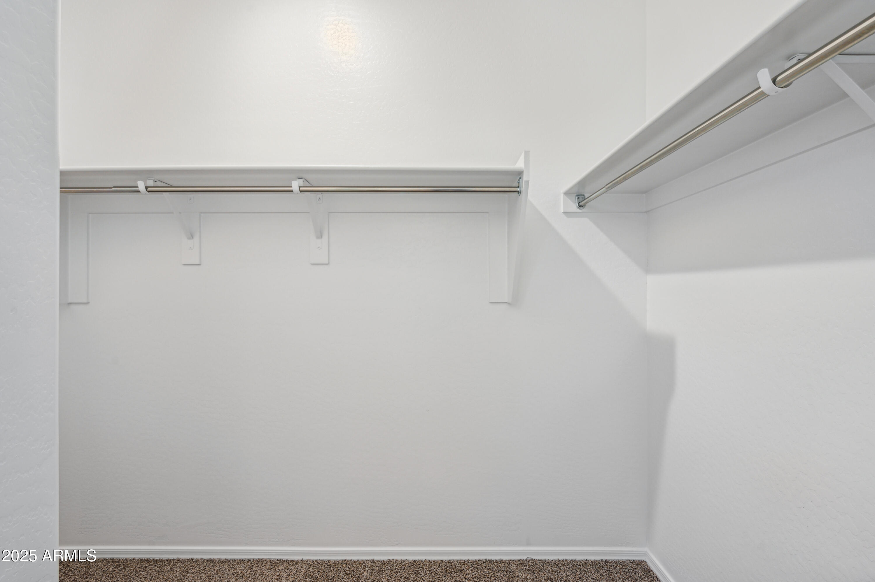 5072 East Umber Road San Tan Valley, AZ 85143 - Photo 24 of 41 a view of small space with racks on the wall