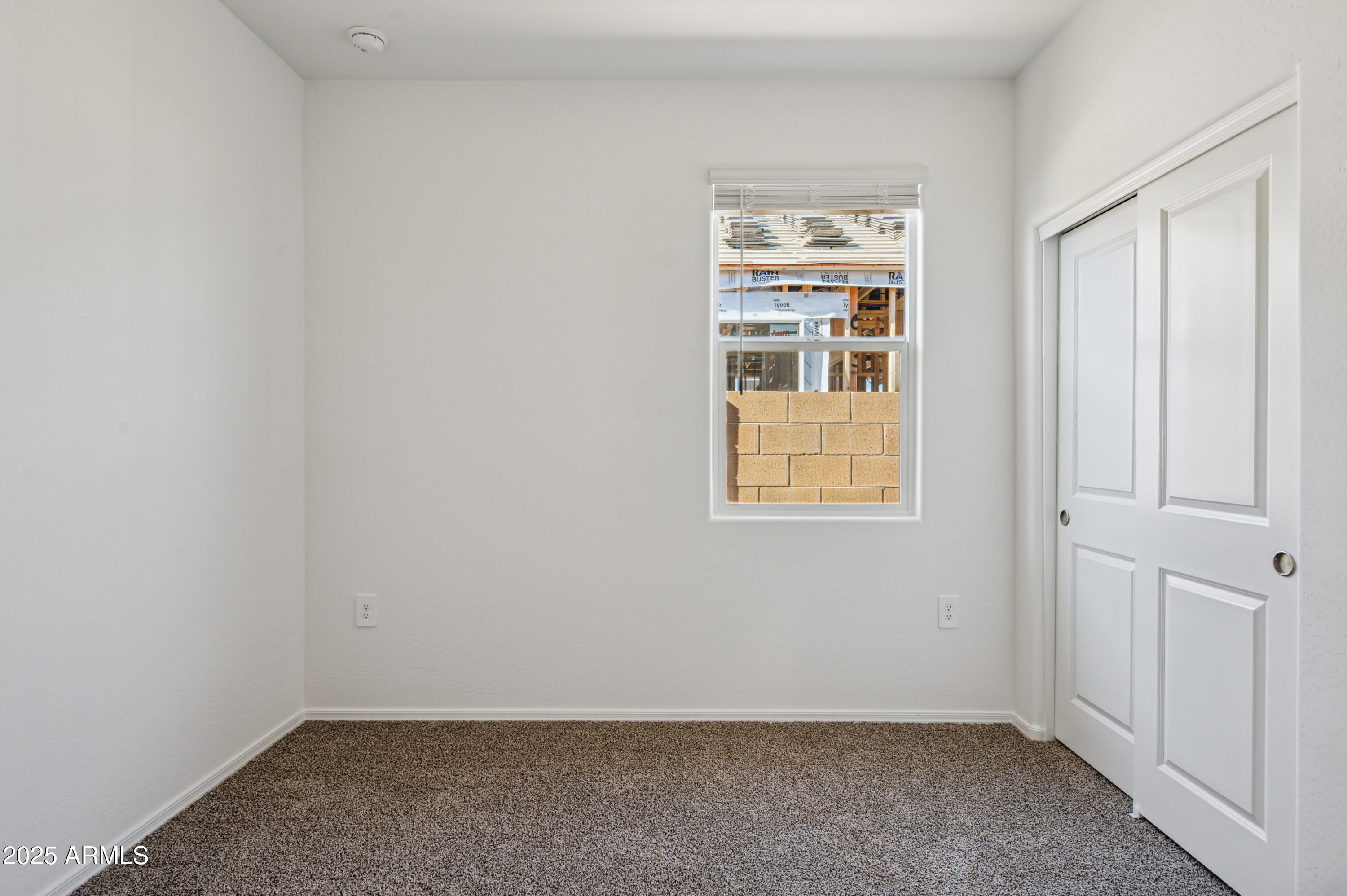 5072 East Umber Road San Tan Valley, AZ 85143 - Photo 9 of 41 an empty room with windows
