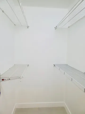 a view of a patio with a table chairs and a table