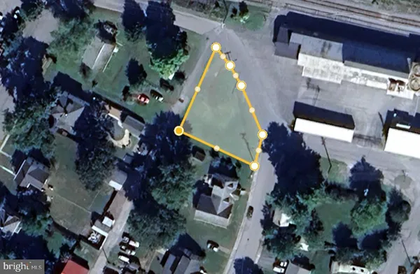 an aerial view of house with yard