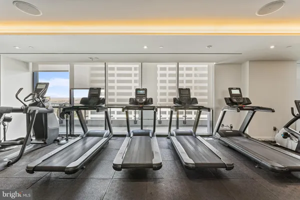 a view of a brick building next to a road