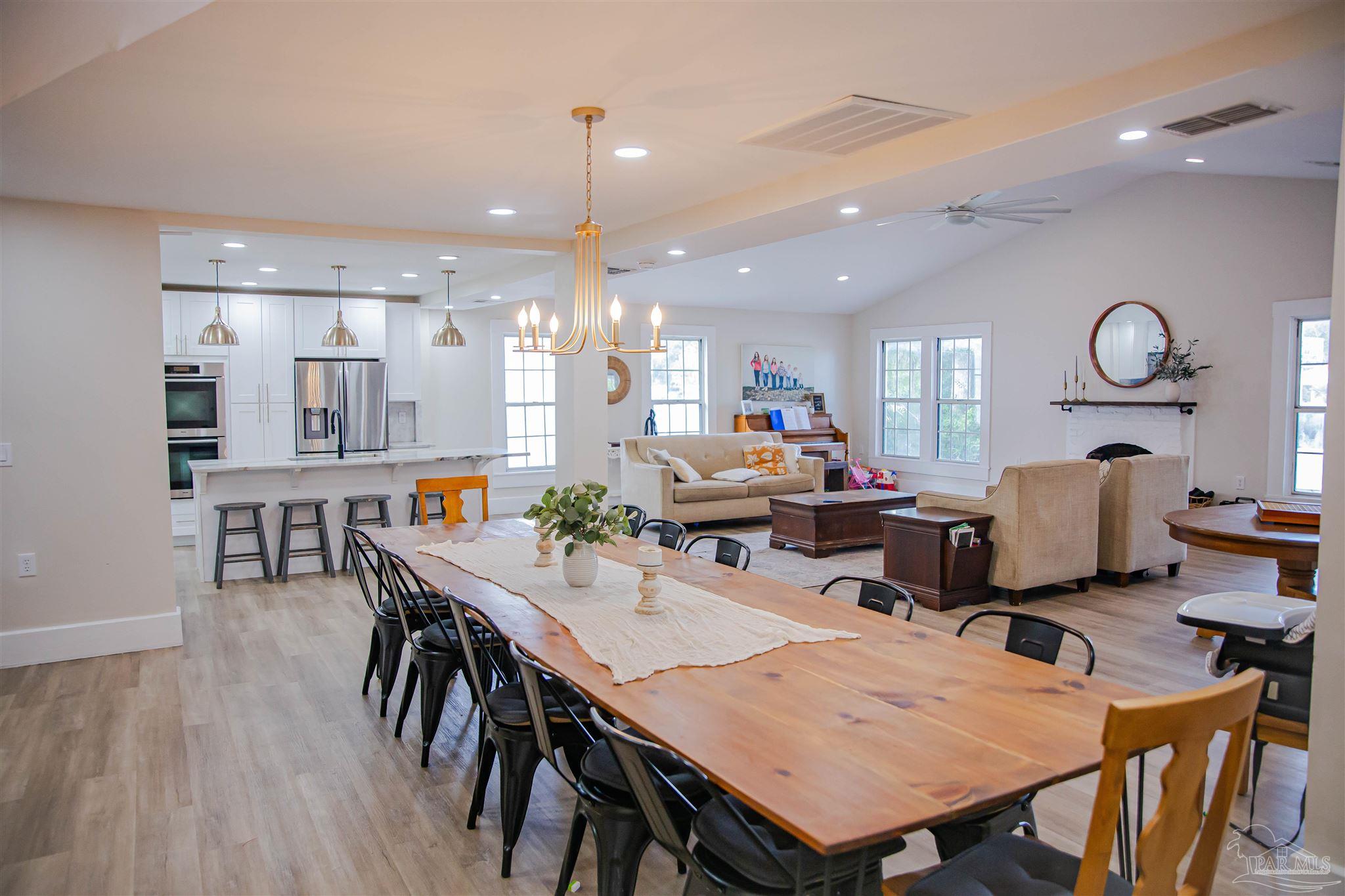 5347 Stewart Street Milton, FL 32570 - Photo 11 of 20 a view of a dining area with furniture