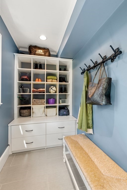 28 Sheffield Road Newton, MA 02465 - Photo 11 of 39 a view of walk in closet with clothes and shoes