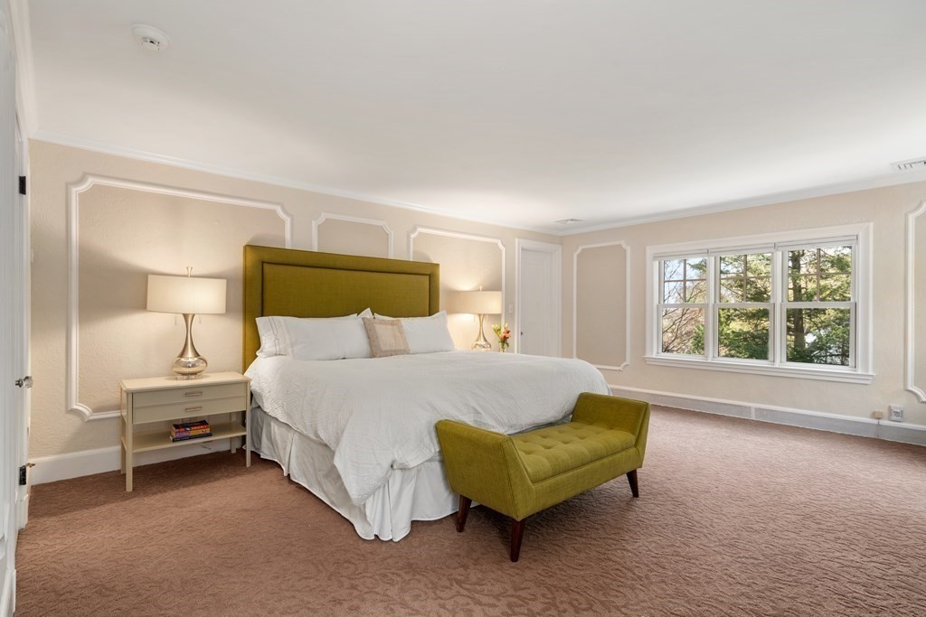 28 Sheffield Road Newton, MA 02465 - Photo 17 of 39 a spacious bedroom with a bed and a large window