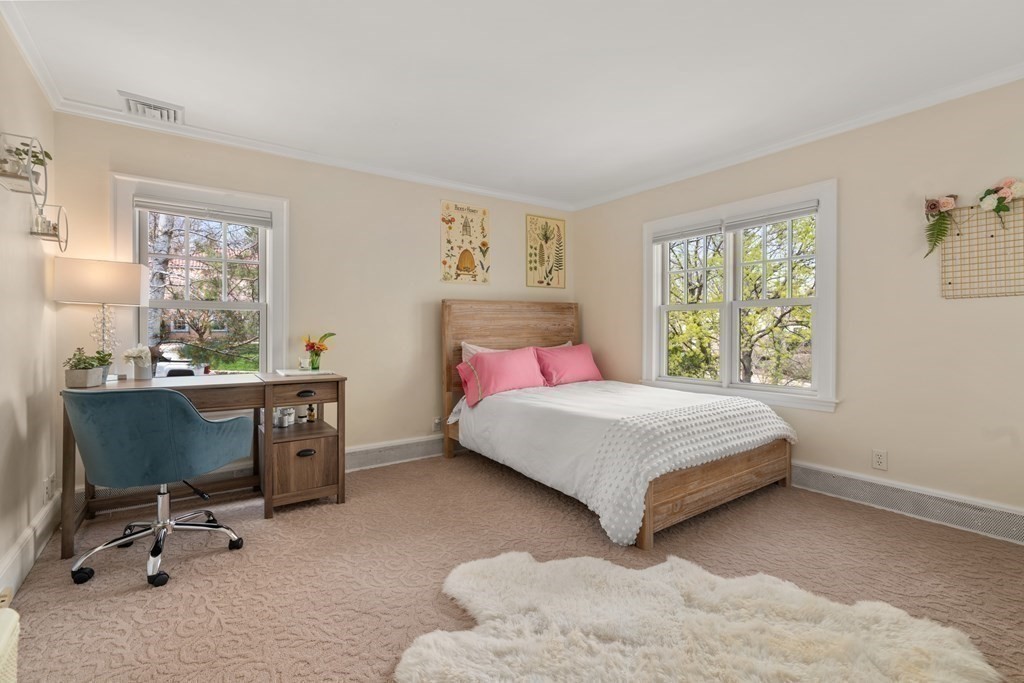 28 Sheffield Road Newton, MA 02465 - Photo 22 of 39 a bedroom with a bed and a window