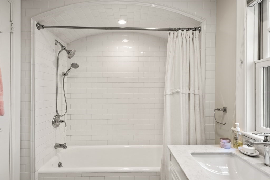 28 Sheffield Road Newton, MA 02465 - Photo 24 of 39 a bathroom with a shower and a sink