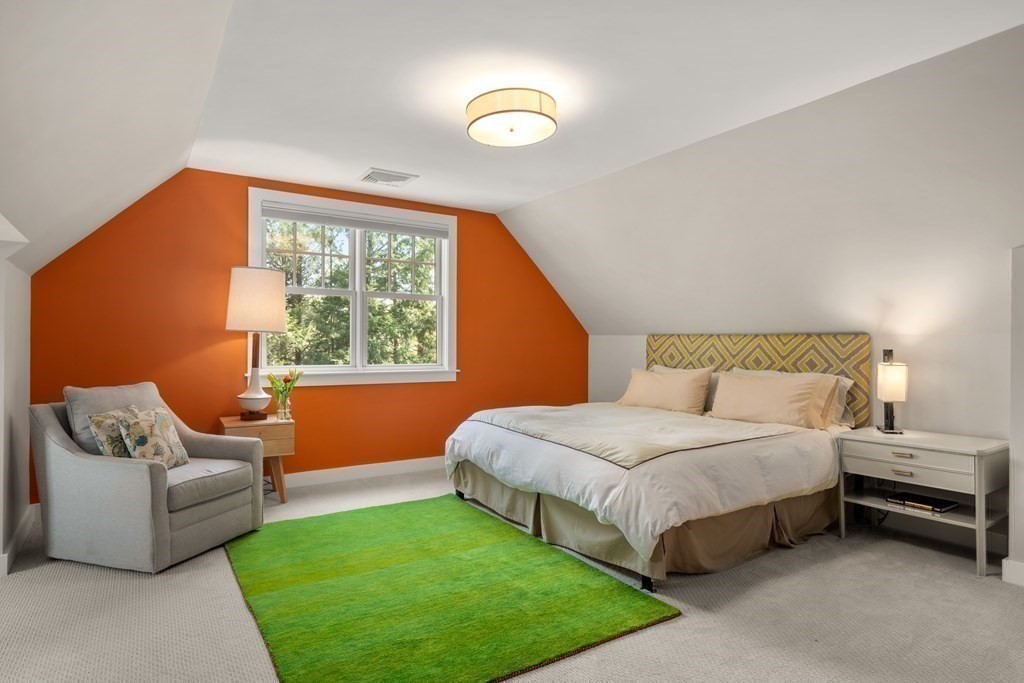 28 Sheffield Road Newton, MA 02465 - Photo 27 of 39 a bedroom with a bed and a couch