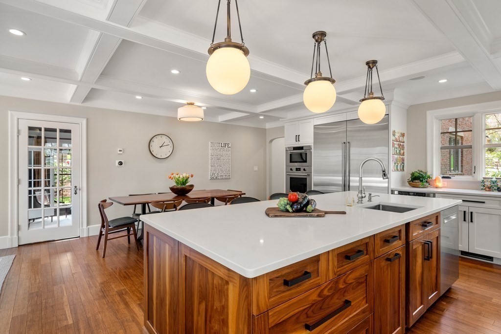 28 Sheffield Road Newton, MA 02465 - Photo 3 of 39 a kitchen with a sink a counter space and wooden floor