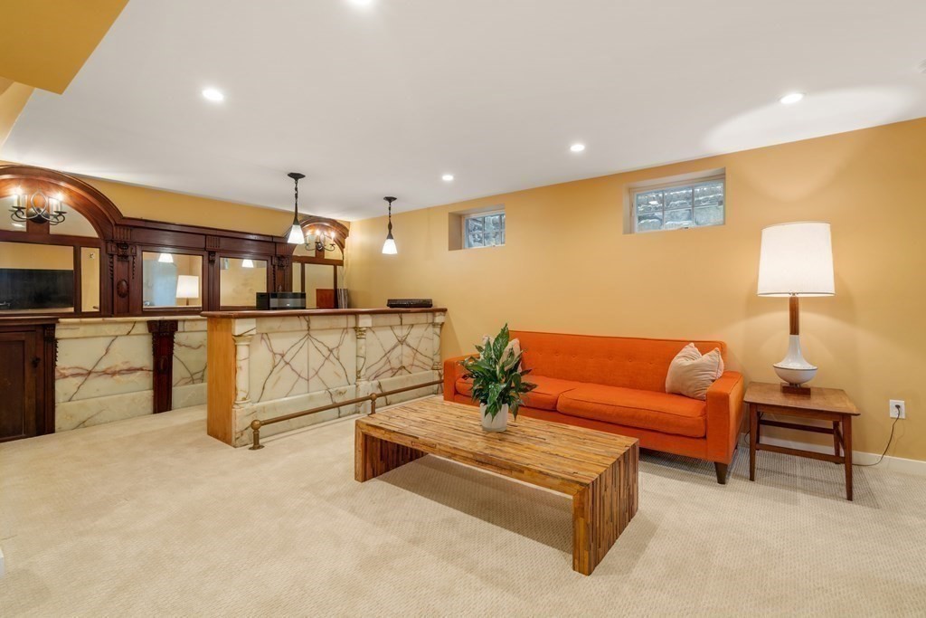 28 Sheffield Road Newton, MA 02465 - Photo 31 of 39 a living room with furniture and a wooden floor
