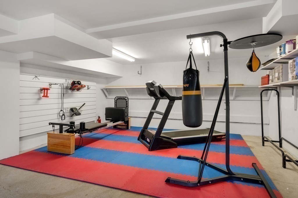 28 Sheffield Road Newton, MA 02465 - Photo 34 of 39 a room with gym equipment and many windows
